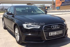 أسود Audi A6 2,8 quatrro للإيجار في Abu-Dhabi