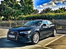 Black Audi A6 for rent in Abu-Dhabi