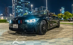 أسود BMW 4 Series للإيجار في Abu-Dhabi