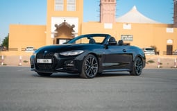 Черный BMW 430i cabrio в аренду в Sharjah