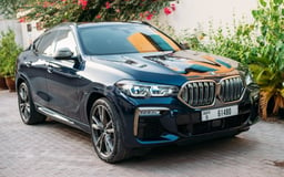 Black BMW X6 M50 for rent in Abu-Dhabi