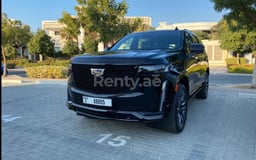 أسود Cadillac Escalade Platinum للإيجار في Abu-Dhabi