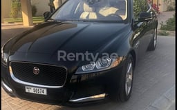 Black Jaguar XF for rent in Dubai