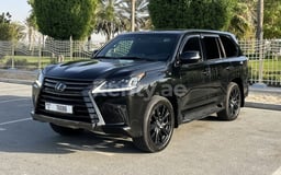 Schwarz Lexus LX 450 zur Miete in Sharjah