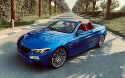 Blue BMW 430i cabrio for rent in Dubai