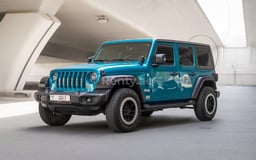 Blue Jeep Wrangler Limited Sport Edition convertible for rent in Dubai