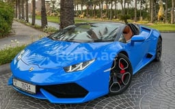 Blue Lamborghini Huracan Spyder for rent in Sharjah