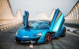 Blue McLaren 570S Spyder for rent in Dubai