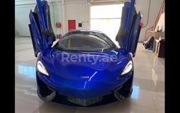 Dark Blue McLaren 570S for rent in Sharjah