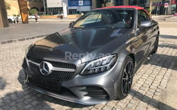 Grigio Scuro Mercedes C200 Cabrio in affitto a Dubai