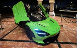 Green McLaren 720 S for rent in Dubai