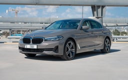 Grey BMW 520i for rent in Dubai