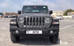 اللون الرمادي Jeep Wrangler Unlimited Sports للإيجار في Abu-Dhabi