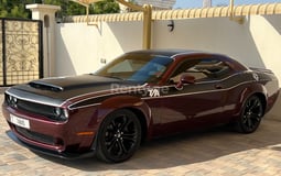 Maroon Dodge Challenger V8 RT Demon Widebody for rent in Dubai