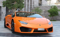 Orange Lamborghini Huracan Spider for rent in Dubai