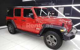 Rot Jeep Wrangler zur Miete in Abu-Dhabi