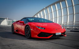Red Lamborghini Huracan Spyder for rent in Abu-Dhabi