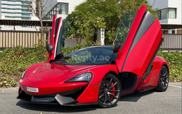 Red McLaren 570S Spyder for rent in Dubai