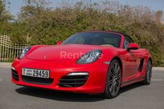 Red Porsche Boxster 981 for rent in Sharjah