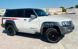 White Nissan Patrol Super Safari for rent in Dubai