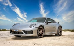 Silver Porsche 911 Carrera 2s for rent in Sharjah