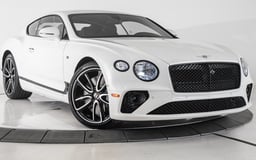 White Bentley Continental for rent in Dubai