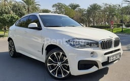 White BMW X6 M power Kit V8 for rent in Abu-Dhabi