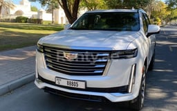 أبيض Cadillac Escalade Platinum للإيجار في Abu-Dhabi