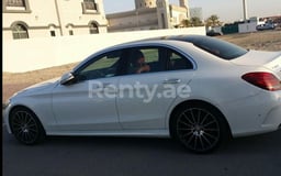 White Mercedes C Class for rent in Dubai