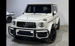 البرتقالي Mercedes G63 AMG للإيجار في Sharjah