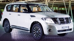 Bright White Nissan Patrol for rent in Abu-Dhabi