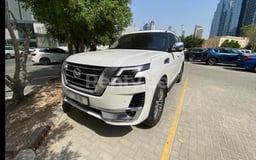 White Nissan Patrol for rent in Sharjah