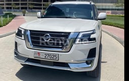 White Nissan Patrol for rent in Sharjah