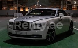 Blanc Rolls Royce Wraith en location à Abu-Dhabi