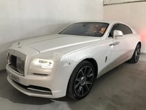 Blanc Rolls Royce Wraith en location à Abu-Dhabi