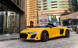 Jaune Audi R8- V10 SPYDER en location à Abu-Dhabi