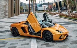 Yellow Lamborghini Aventador Roadster for rent in Dubai