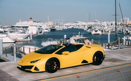 Yellow Lamborghini Evo Spyder for rent in Dubai