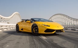Yellow Lamborghini Huracan Spyder for rent in Sharjah