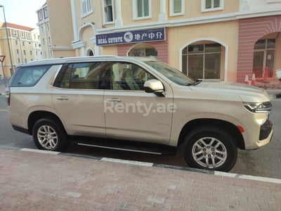 Beige Chevrolet Tahoe for rent in Abu-Dhabi 0