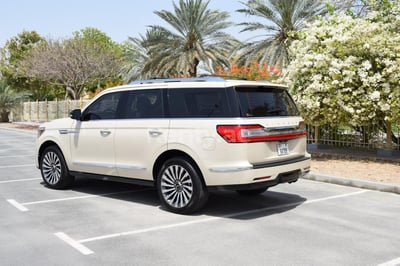 Beige Lincoln Navigator for rent in Dubai 0