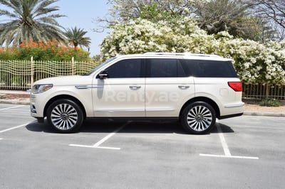 Beige Lincoln Navigator for rent in Dubai 1