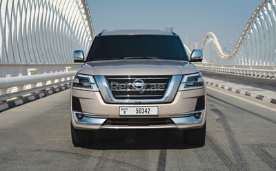 Beige Nissan Patrol V8 Platinum for rent in Dubai 0