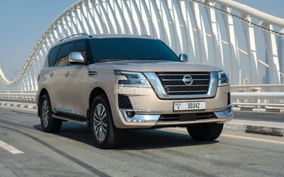 Beige Nissan Patrol V8 Platinum for rent in Abu-Dhabi 1