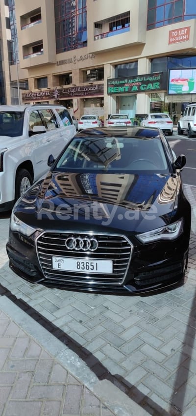 Black Audi A6 for rent in Dubai 0