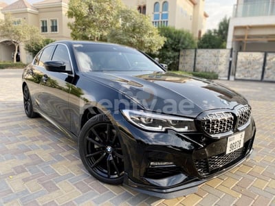 Black BMW 3 Series for rent in Dubai 1