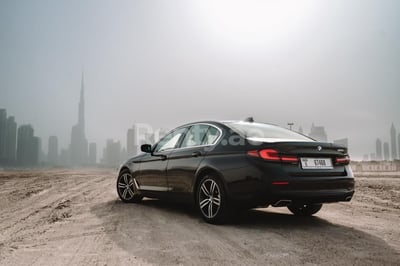 Black BMW 5 Series for rent in Sharjah 1