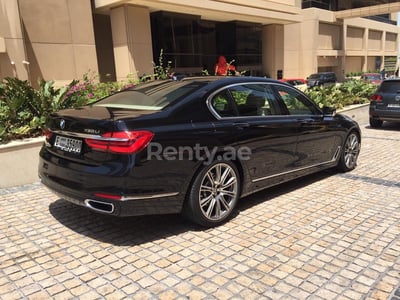 Black BMW 730 Li for rent in Dubai 1