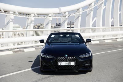 Black BMW 430i cabrio for rent in Dubai 1