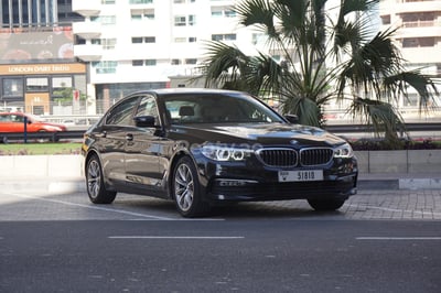 Black BMW 520I for rent in Sharjah 0